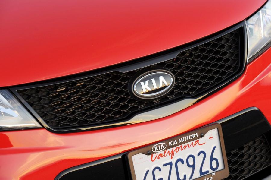  Kia Forte Koup 2009 года  (фото 133 из 169)